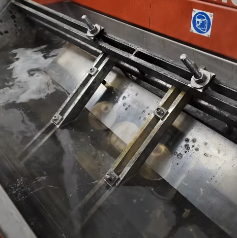 Provtryckning av topplock i vattenbad